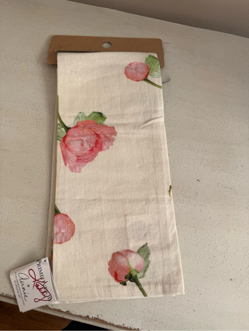 Primitives by Kathy Cream Towel with Pink Peony Design and Embroidered Script